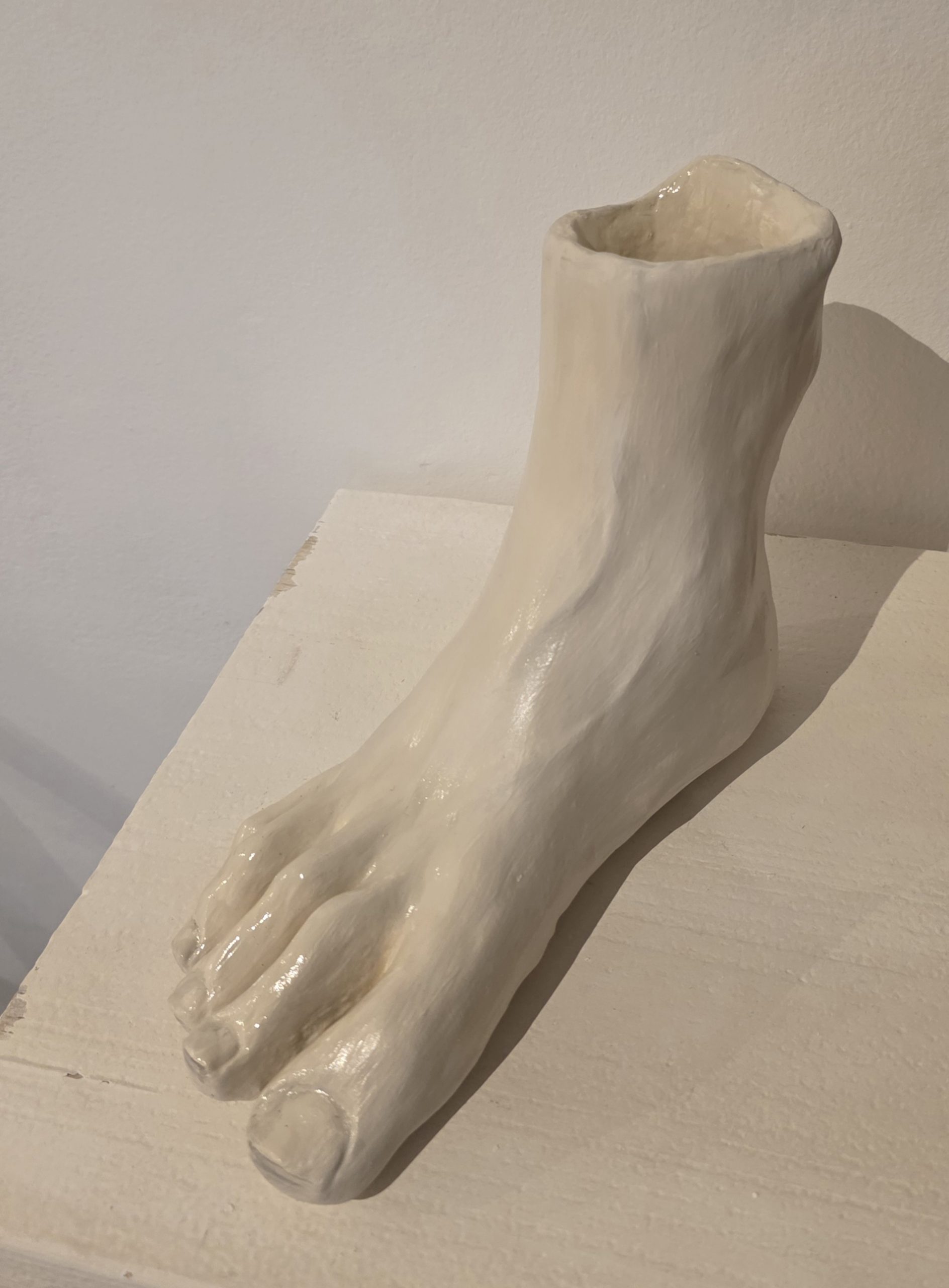 Escultura pie