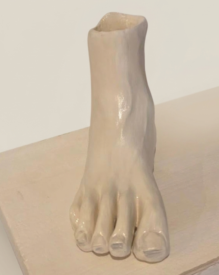 Escultura pie